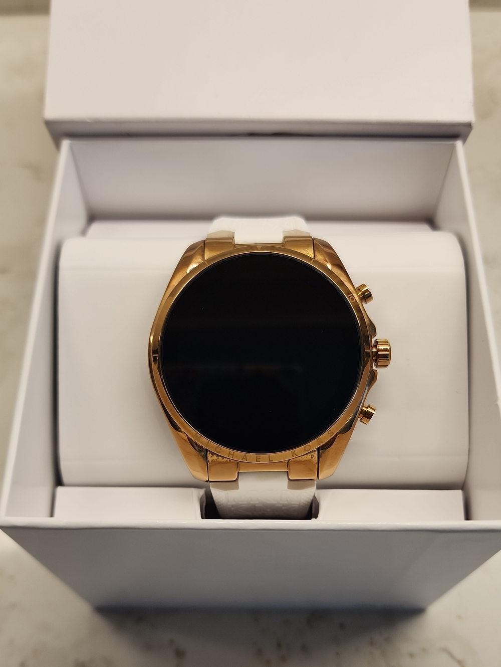 Michael Kors Gold-Tone Smartwatch with White Strap. Extra Color Bands Included.
